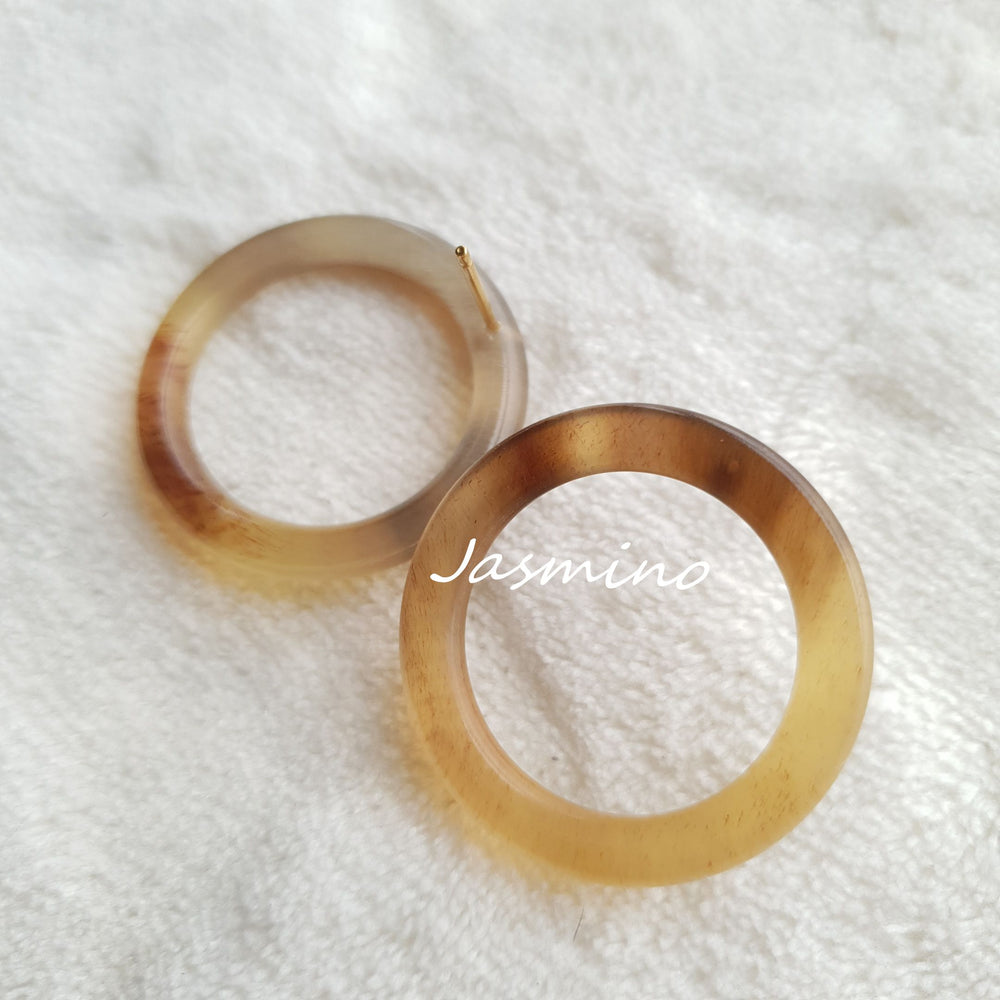 
                  
                    Unique handmade Minimalist Vintage stud earrings feature a thin circle shape with a light yellow color
                  
                