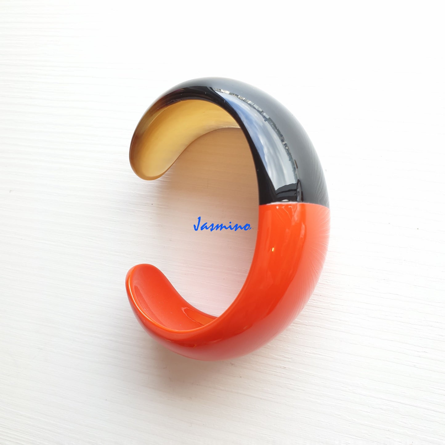 Jasmino Simple Vintage cuff bracelet features an orange half and a white half in natural buffalo horn for women on Christmas gifts