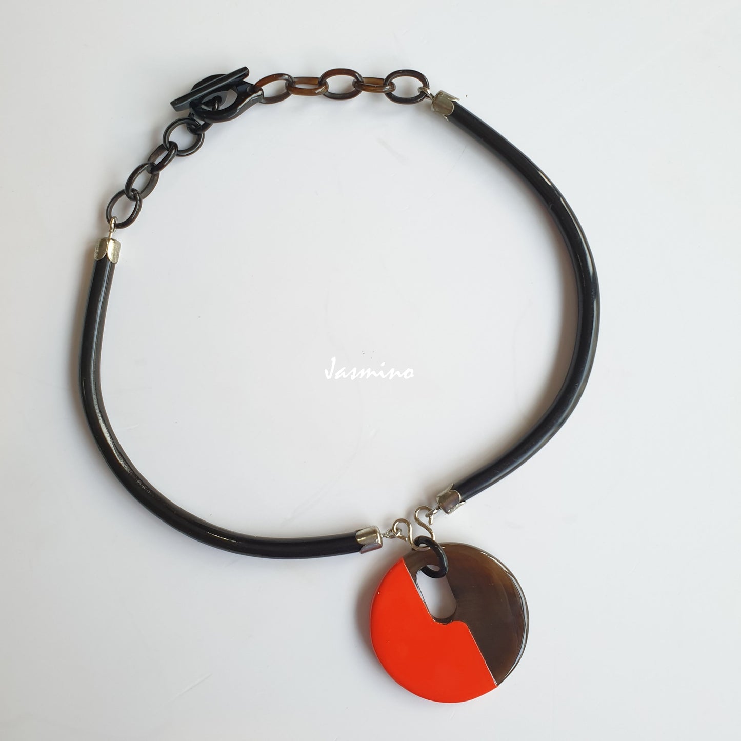 Jasmino unique handmade Trendy Vintage adjustable necklace is detailed by half orange and half brown in natural buffalo horn for women