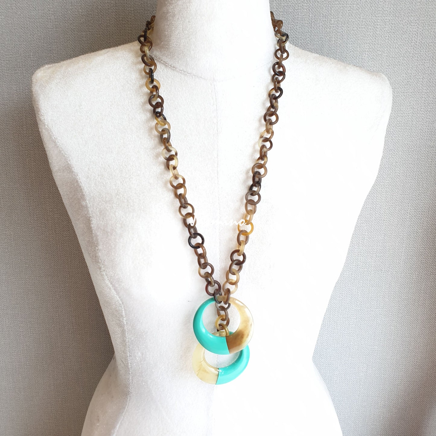 The necklace has large pieces with half natural horn and half turquoise lacquer on the bottom, unique gift for her