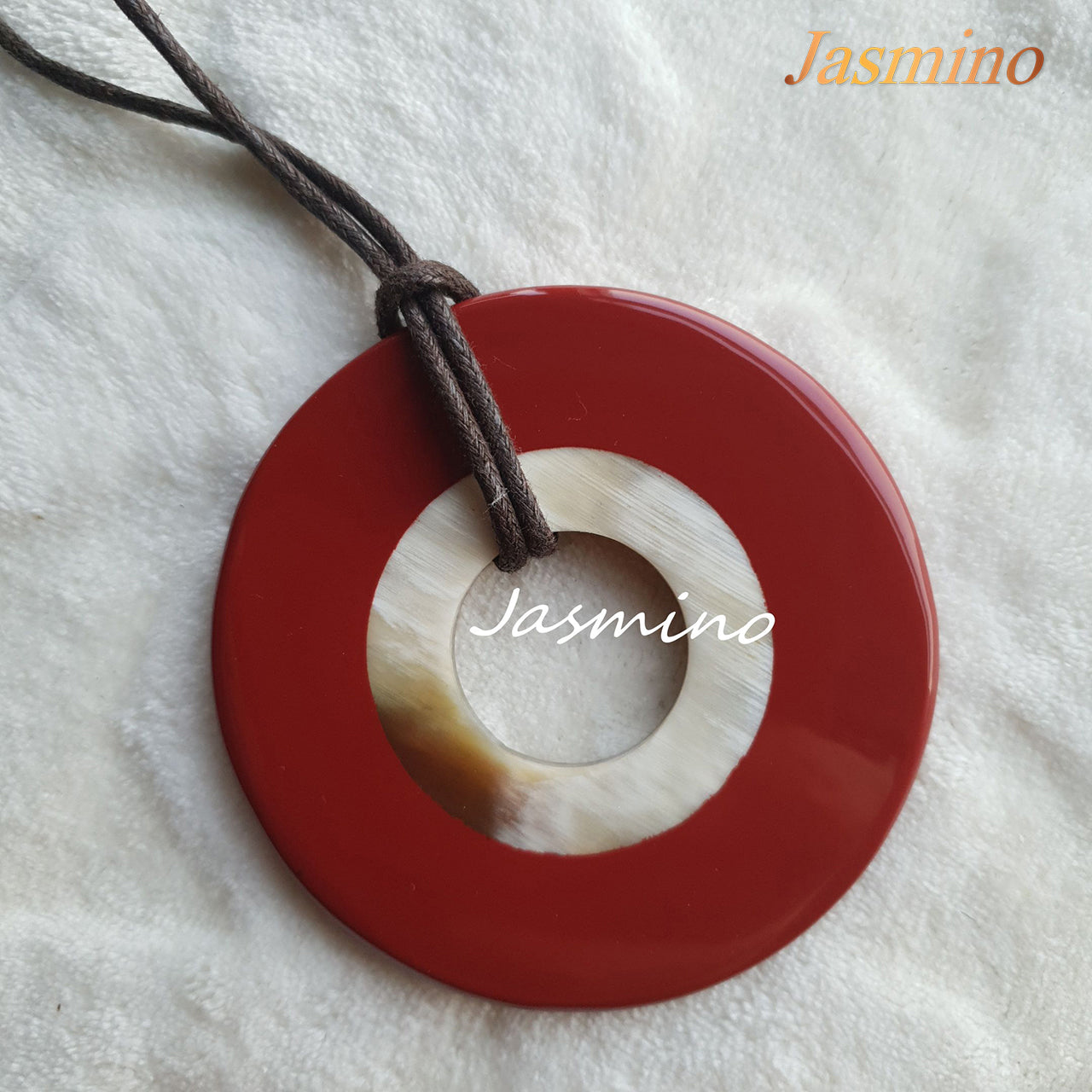 round red maple horn pendant on the light background, impressive Christmas gift for her