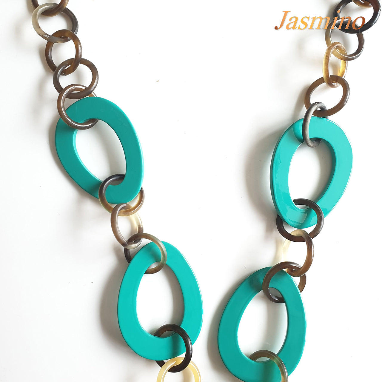 The necklace has several large biscay green pieces in natural light, impressive gift for her