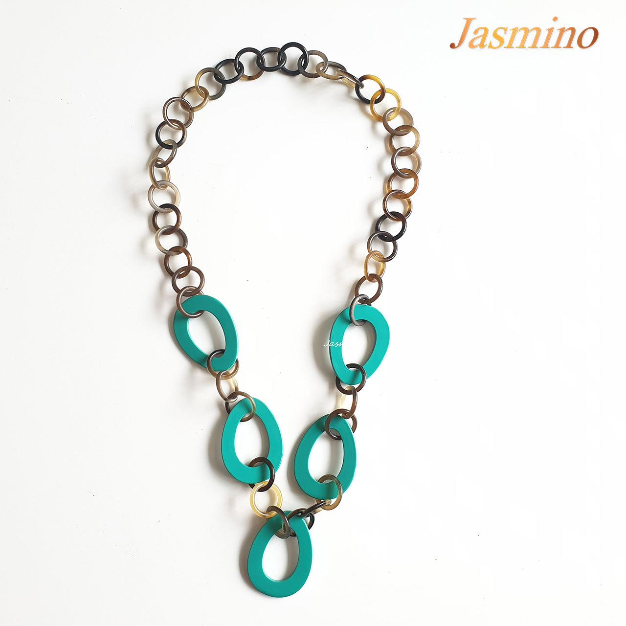 The necklace has several large biscay green pieces in natural light, impressive gift for her