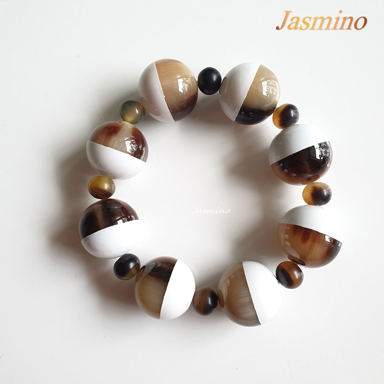 Jasmino unique handmade Ethnic Vintage alternating circle bangle bracelet features brown and white in natural buffalo horn