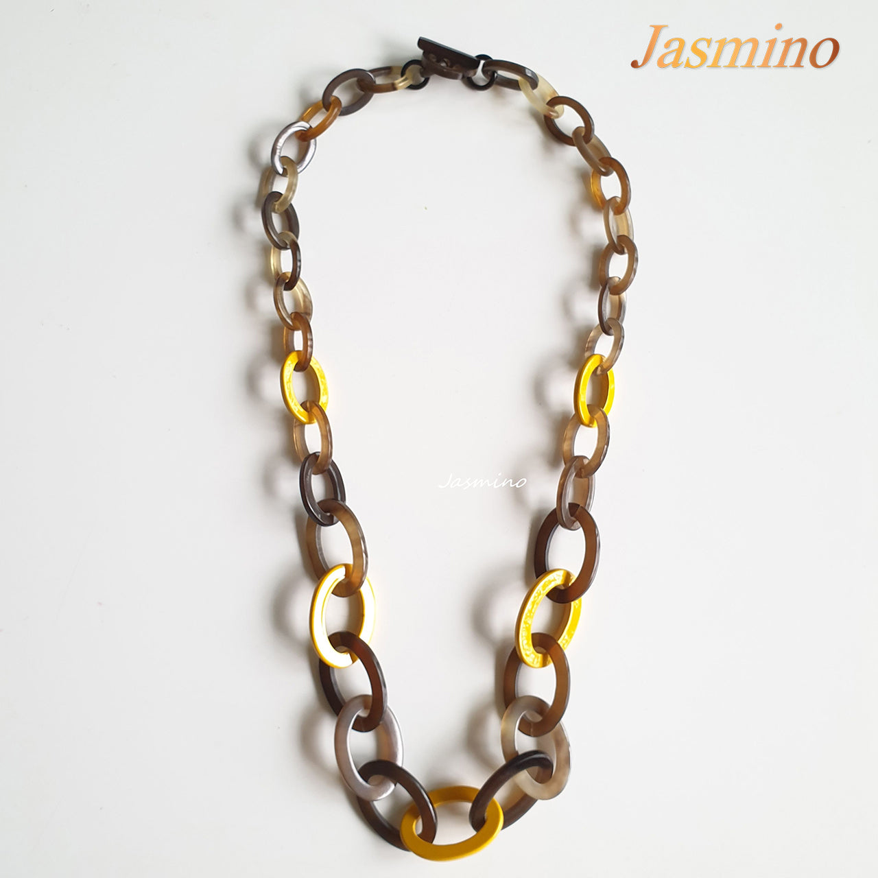 chain elliptical vibrant yellow lacquer necklace in natural light, impressive gift for her