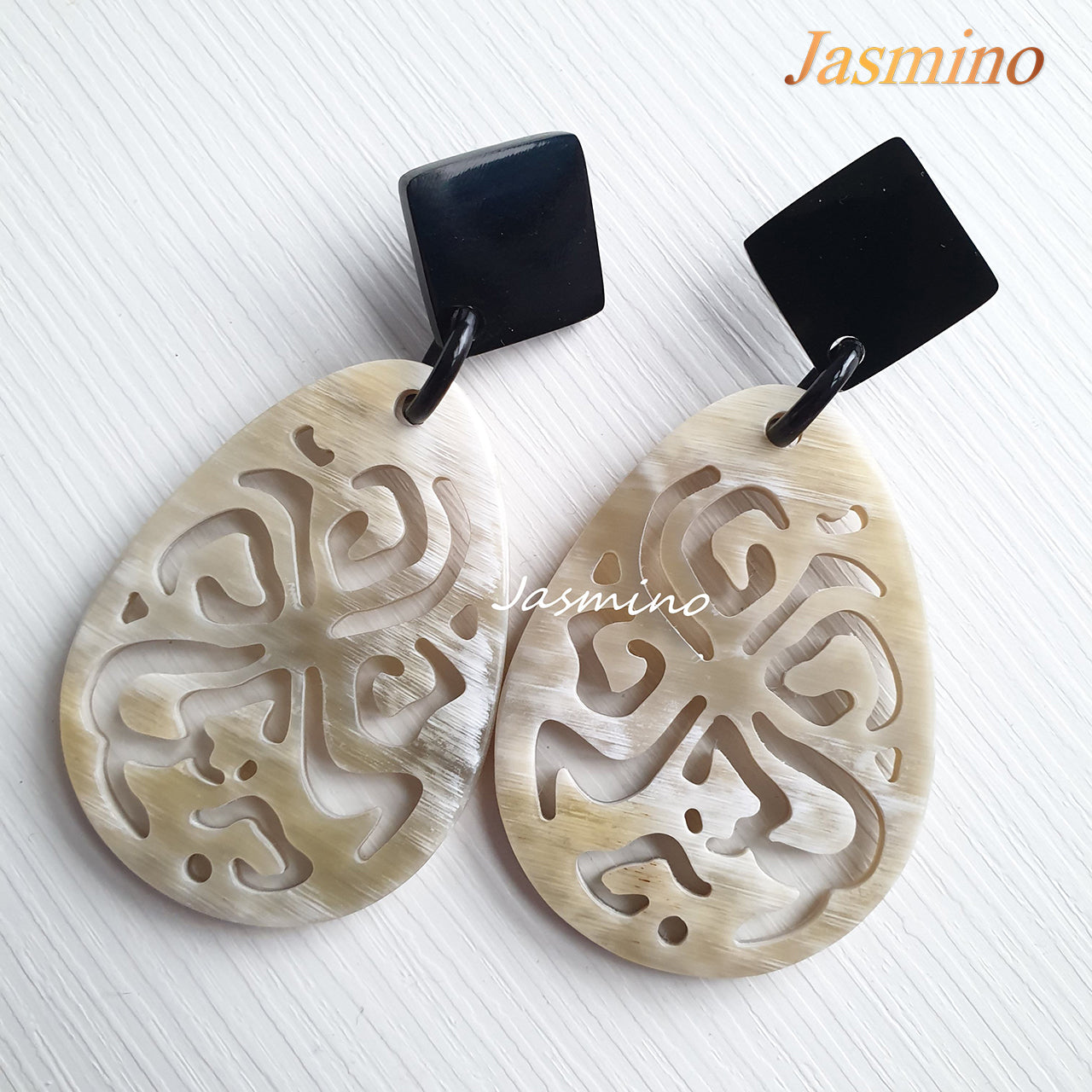 Jasmino unique handmade white large oval drop earrings are inspired by a spider for Halloween costumes and parties