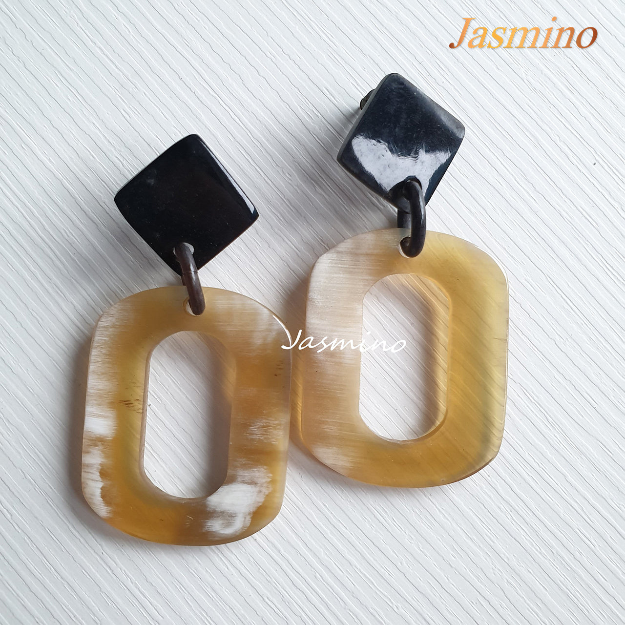 Jasmino unique handmade rectangle drop earrings feature a light colour for festivals and gifts