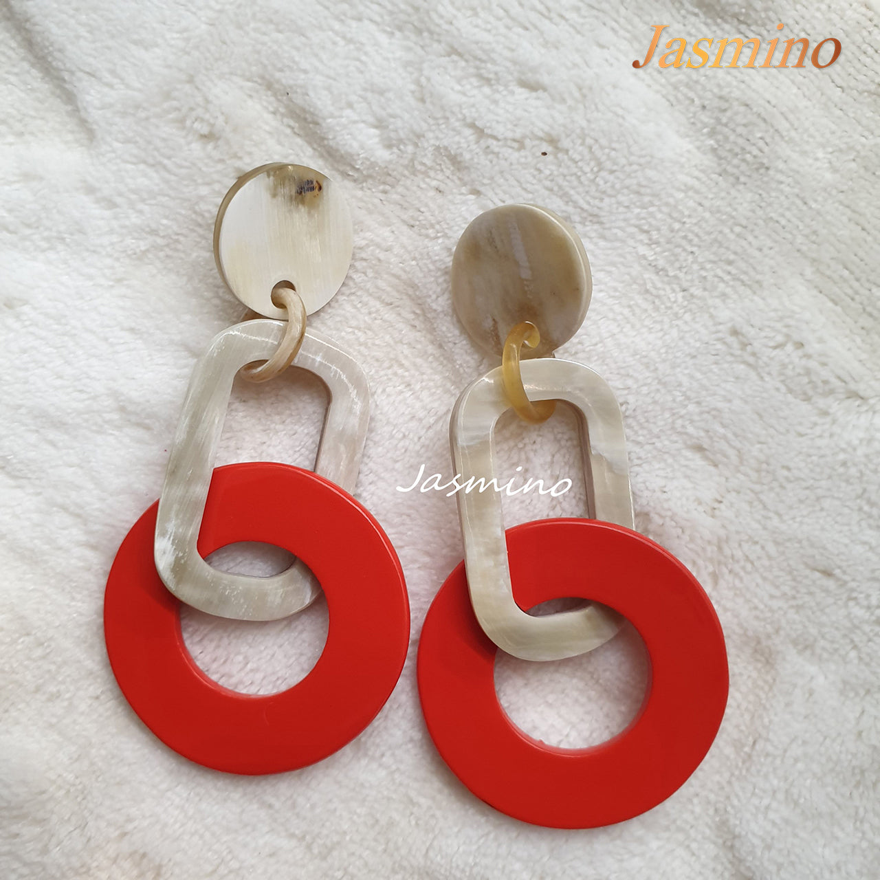 Unique handmade festival link drop earrings are shaped by a rectangle and square, made of natural buffalo horn. It colours are red and white