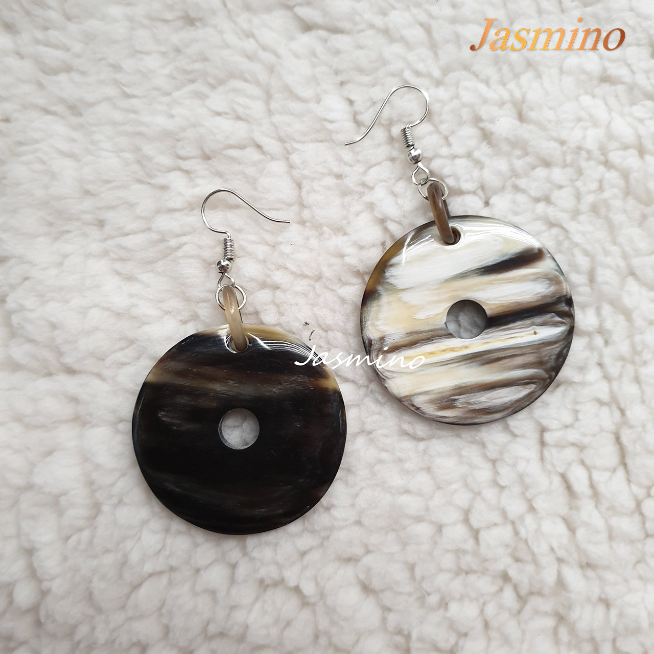 Jasmino unique handmade dangle earrings are shaped by a cake donut shape, made of natural buffalo horn