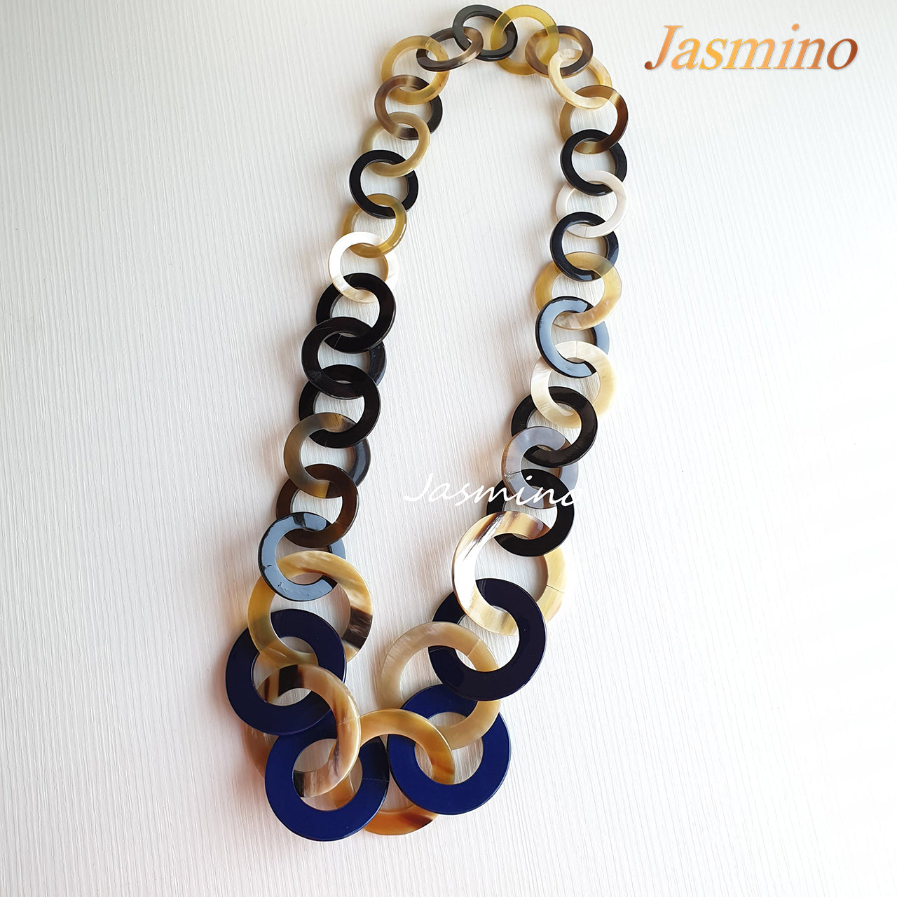 The necklace has several classic blue pieces in natural light, impressive gift for her