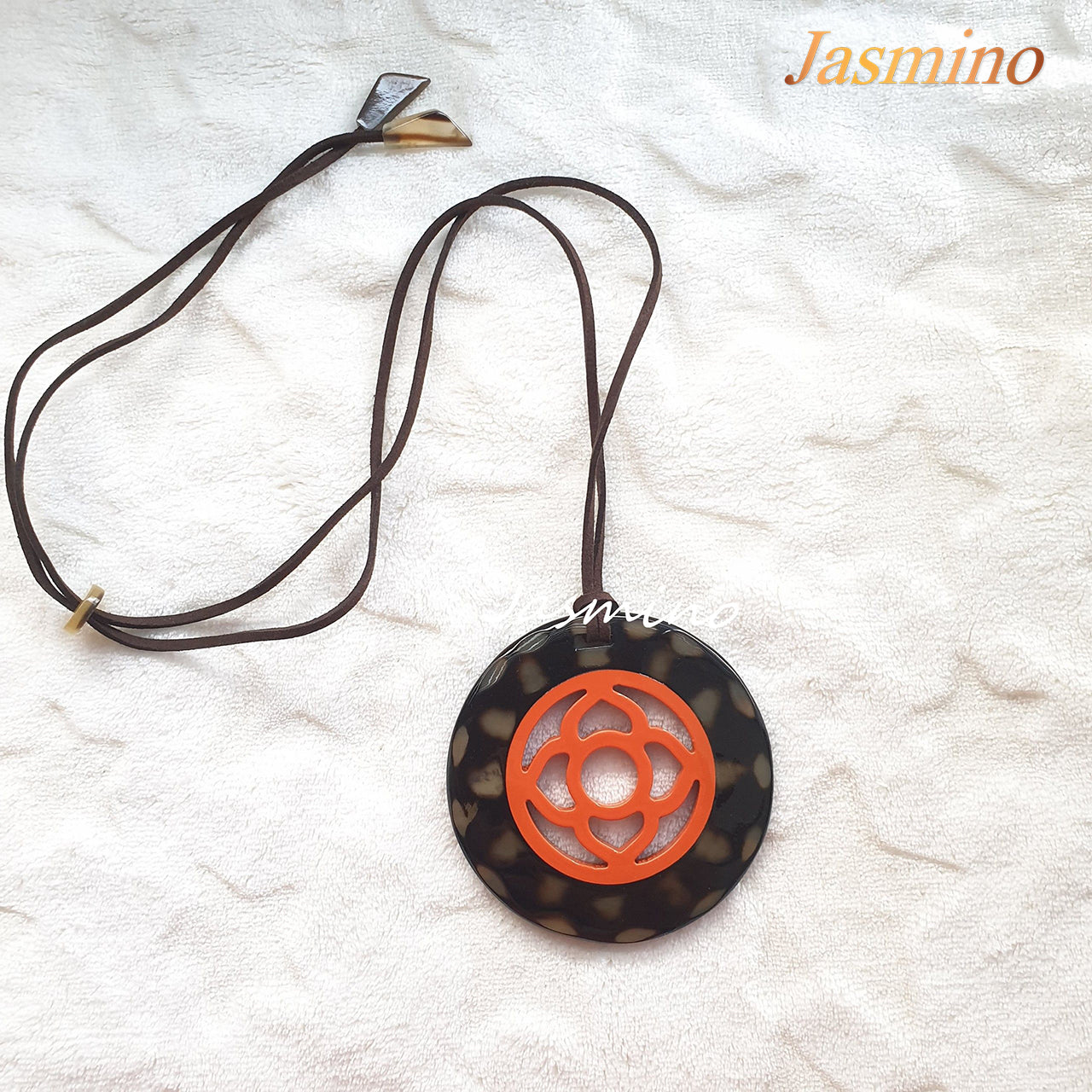 unique handmade pendant with an orange peel circular pattern in the center, impressive gift for her