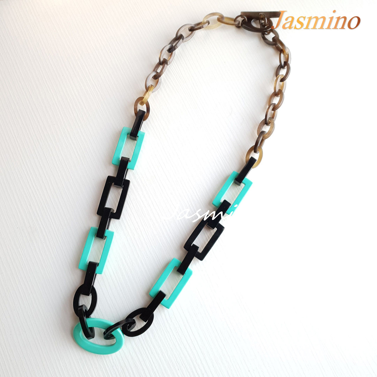 The necklace has some large turquoise links, a unique gift for her