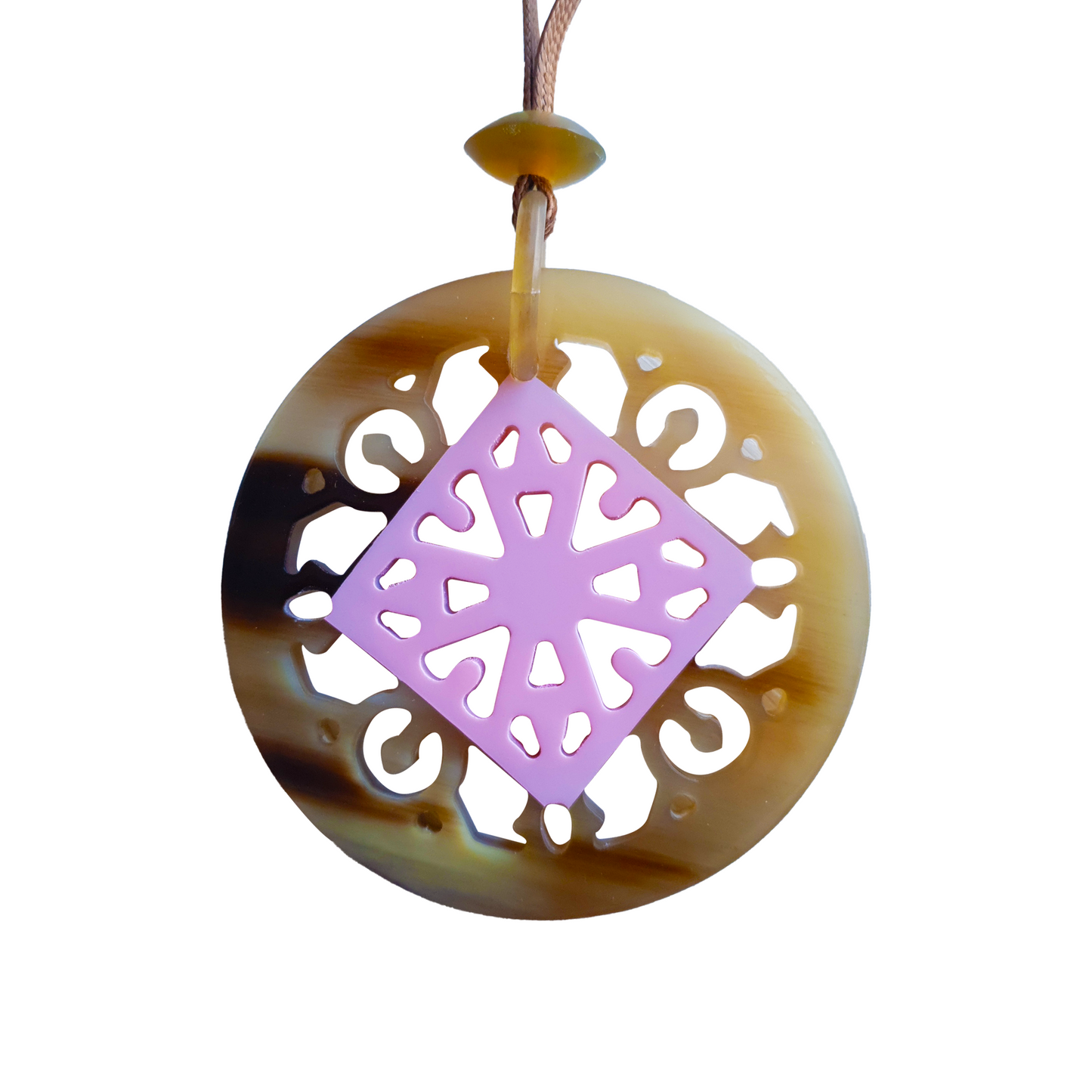 round pendant with bright natural buffalo horn contour, inside with unique lozenge pattern made from buffalo horn painted light pink on a light background, is an impressive gift for her