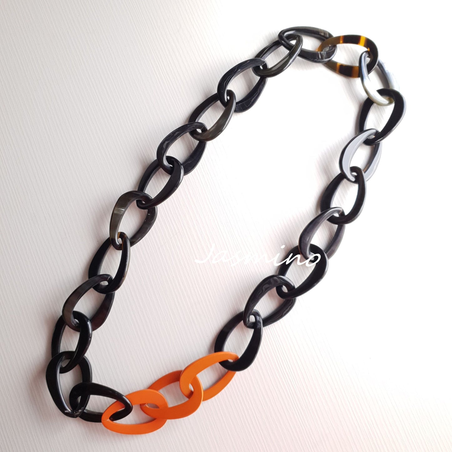 The necklace has several orange peel links in natural light, unique gift for her