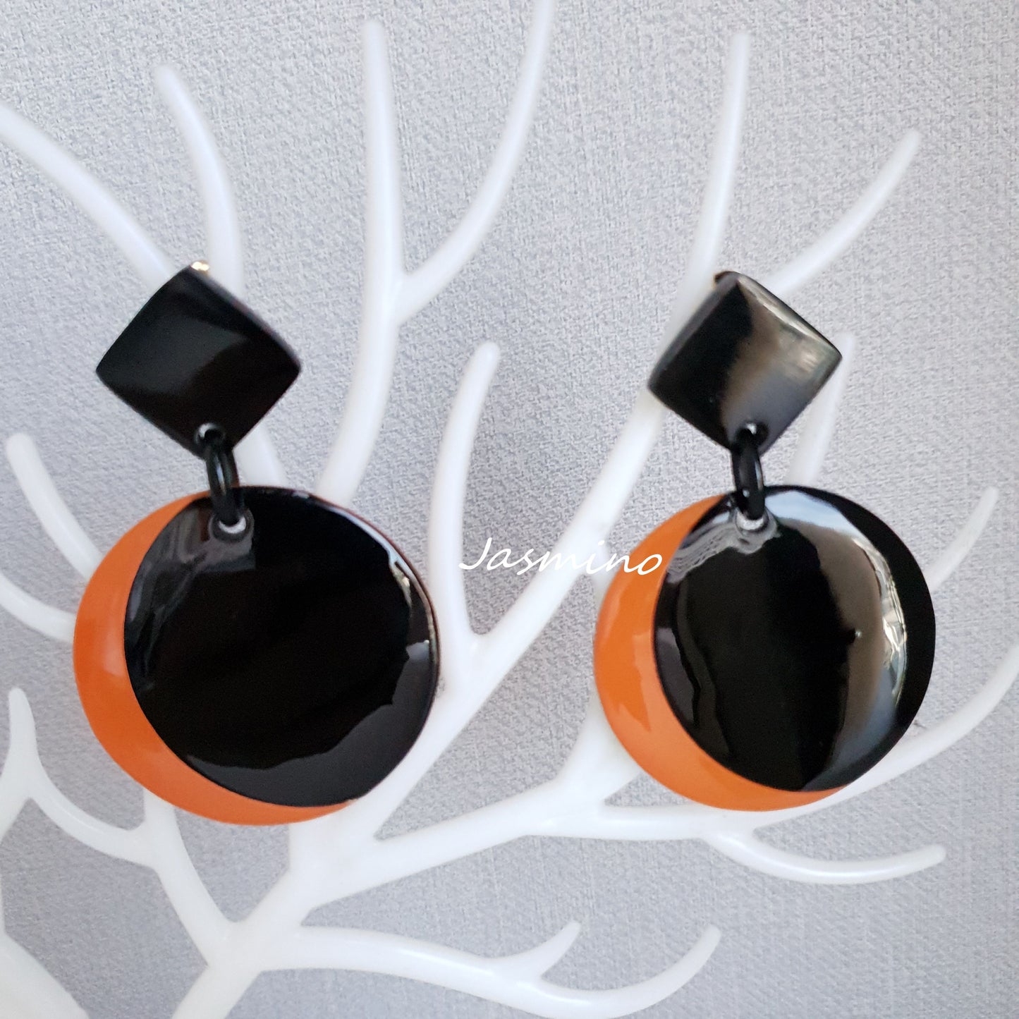 Dainty crescent moon circle earrings feature black and orange made of natural buffalo horn 