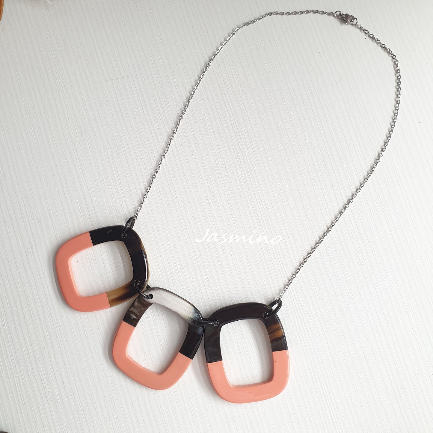 The necklace has large pieces with half natural horn and half salmon lacquer, unique gift for her