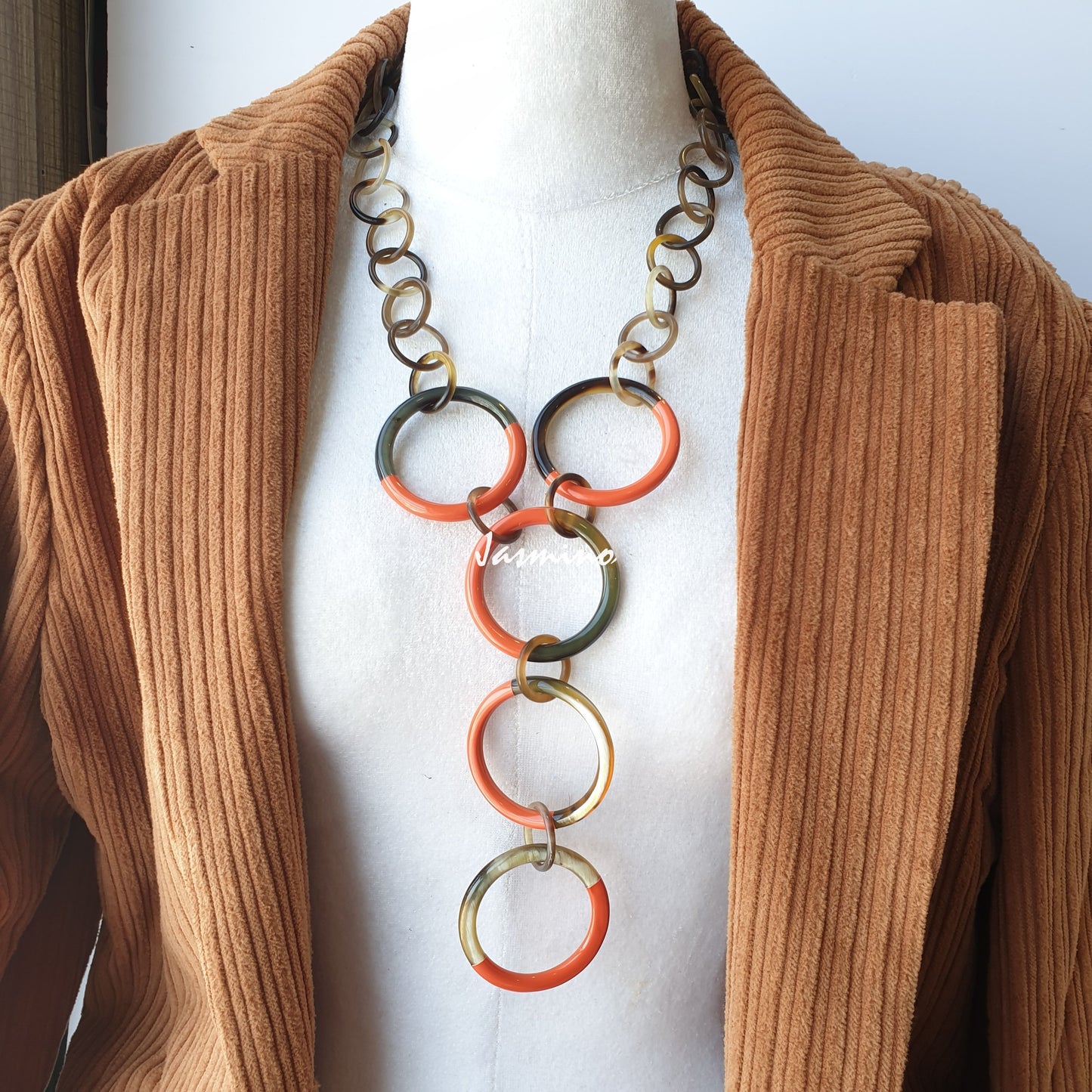 unique handmade Bohemian circle chain link necklace jewelry features orange in natural buffalo horn