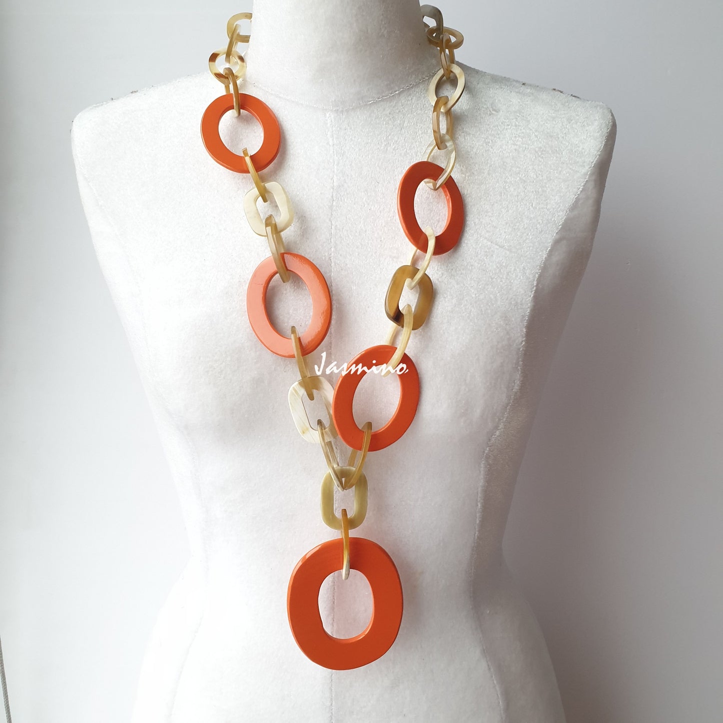 The necklace has some large orange peel pieces, a unique gift for her