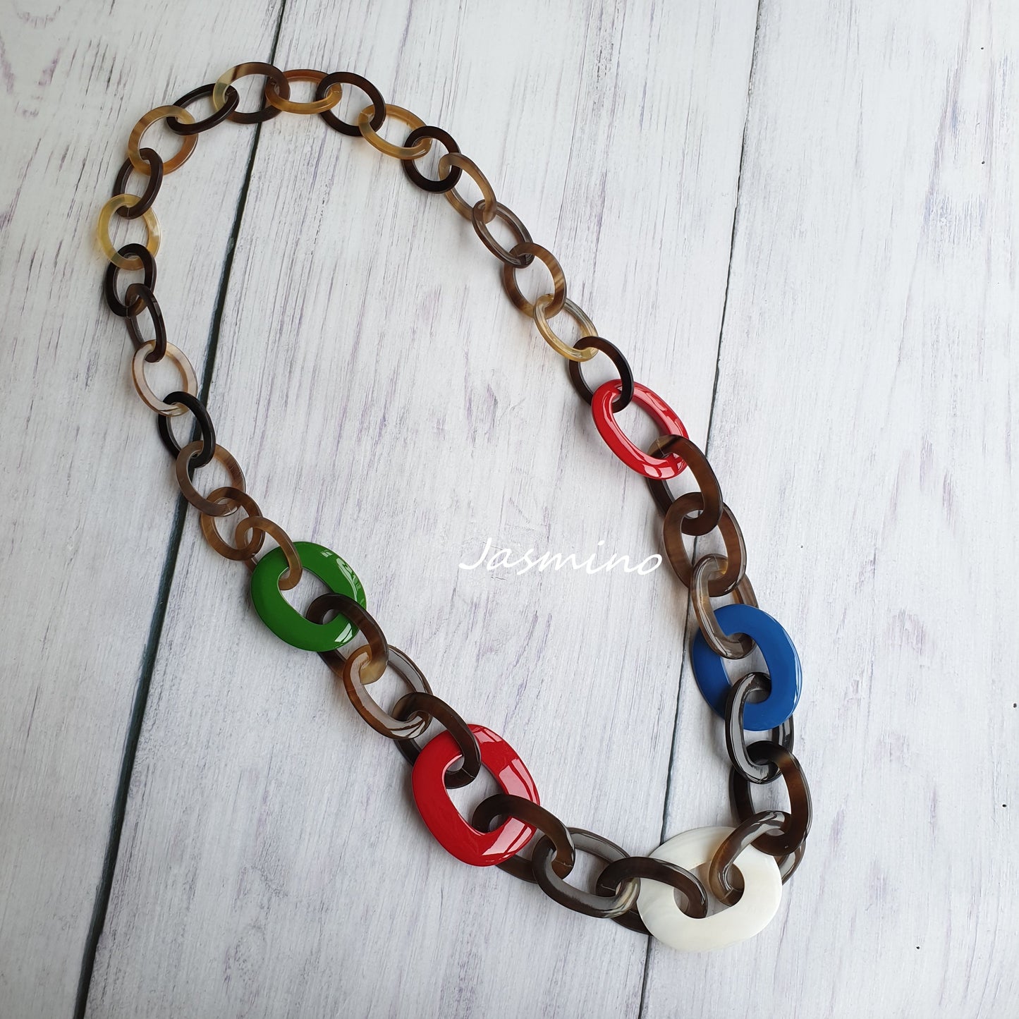 unique handmade Vintage large chain link necklace jewelry is shaped by a donut with blue and red in natural buffalo horn