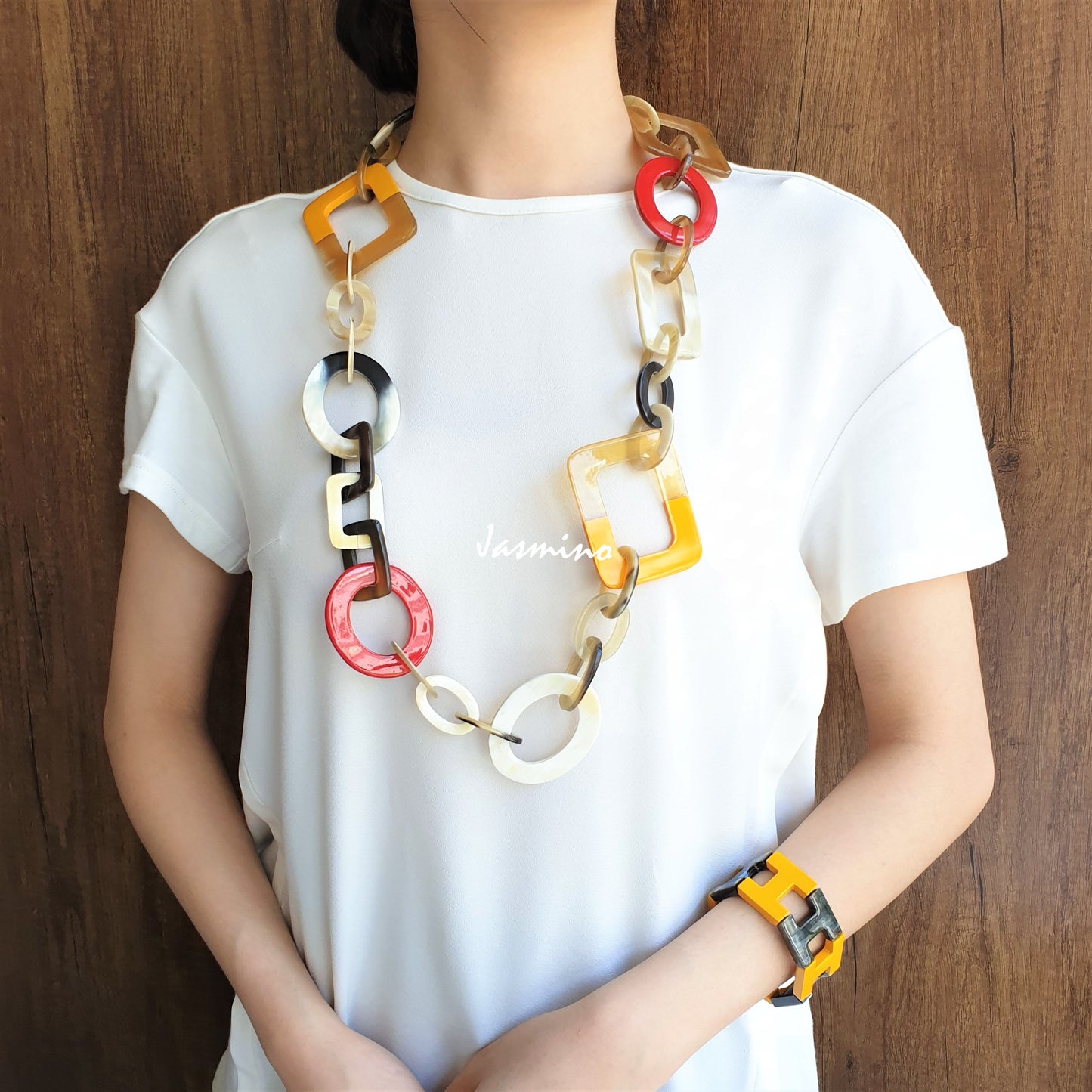 Jasmino unique handmade Bohemian chain link necklace features brown and yellow in natural buffalo horn