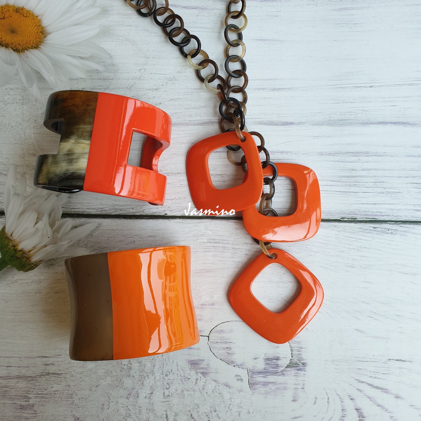 A set of unique handmade Vintage diamond shaped necklace and two cuff bracelets featured orange in natural buffalo horn for women's gifts