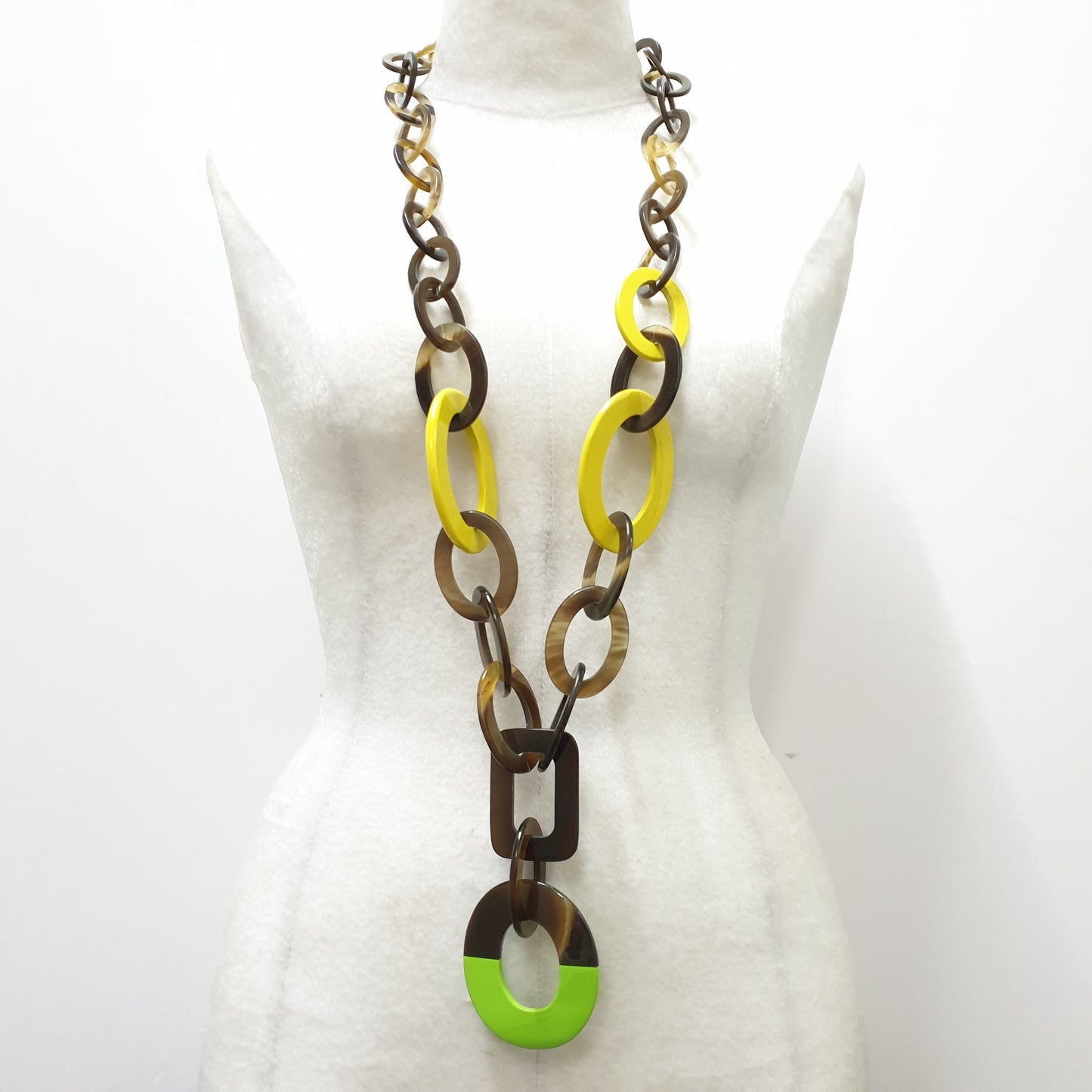 Jasmino unique handmade Bohemian chain link necklace features brown, lime green, and yellow in natural buffalo horn for women