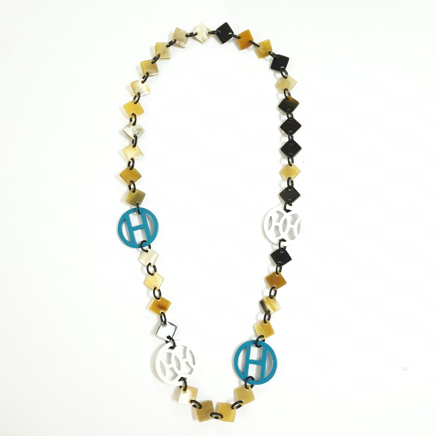 Jasmino unique handmade Bohemian diamond shaped chain link features turquoise and white in natural buffalo horn for women