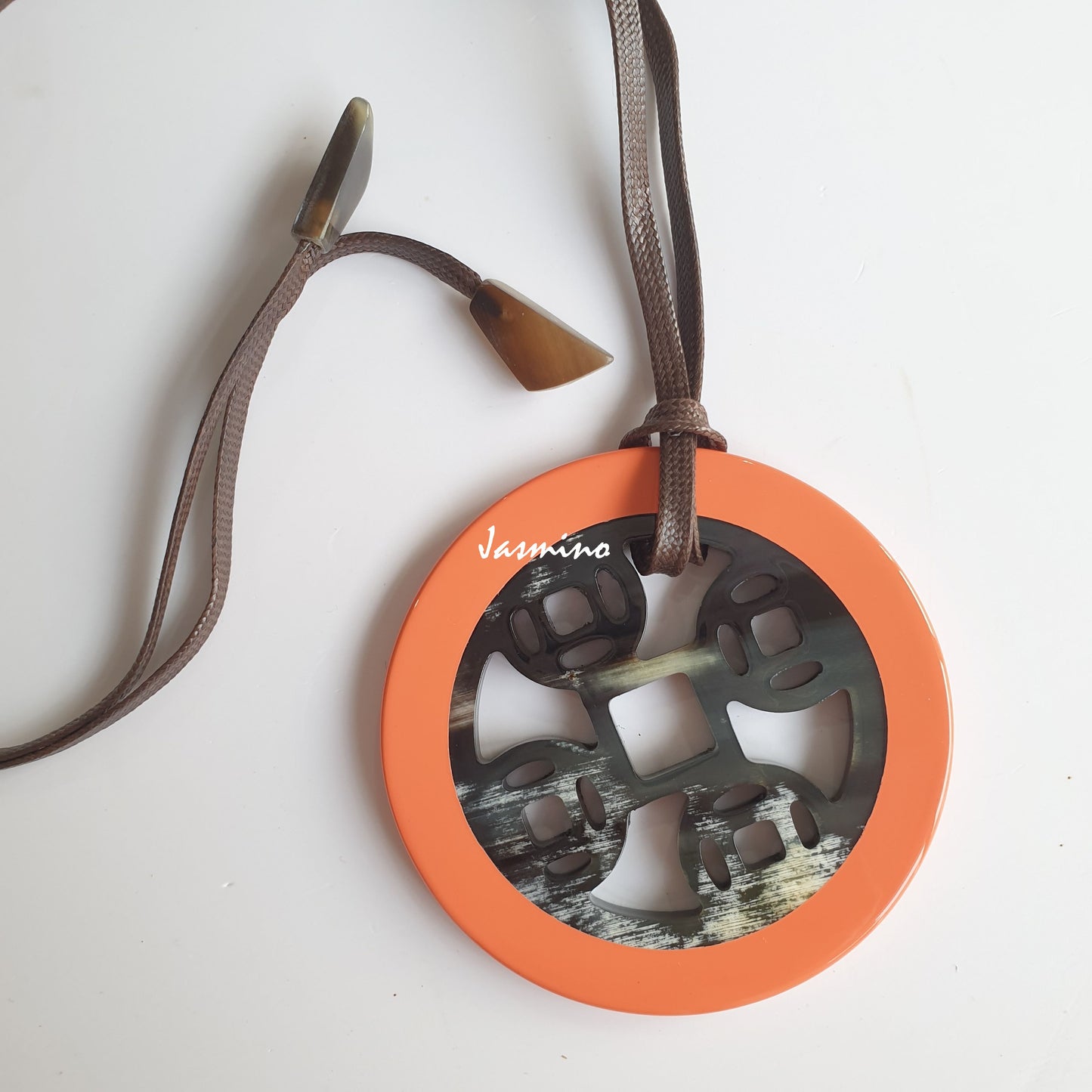 Jasmino unique handmade Vintage circle necklace features a central brown square shape and an orange outline in natural buffalo horn for women