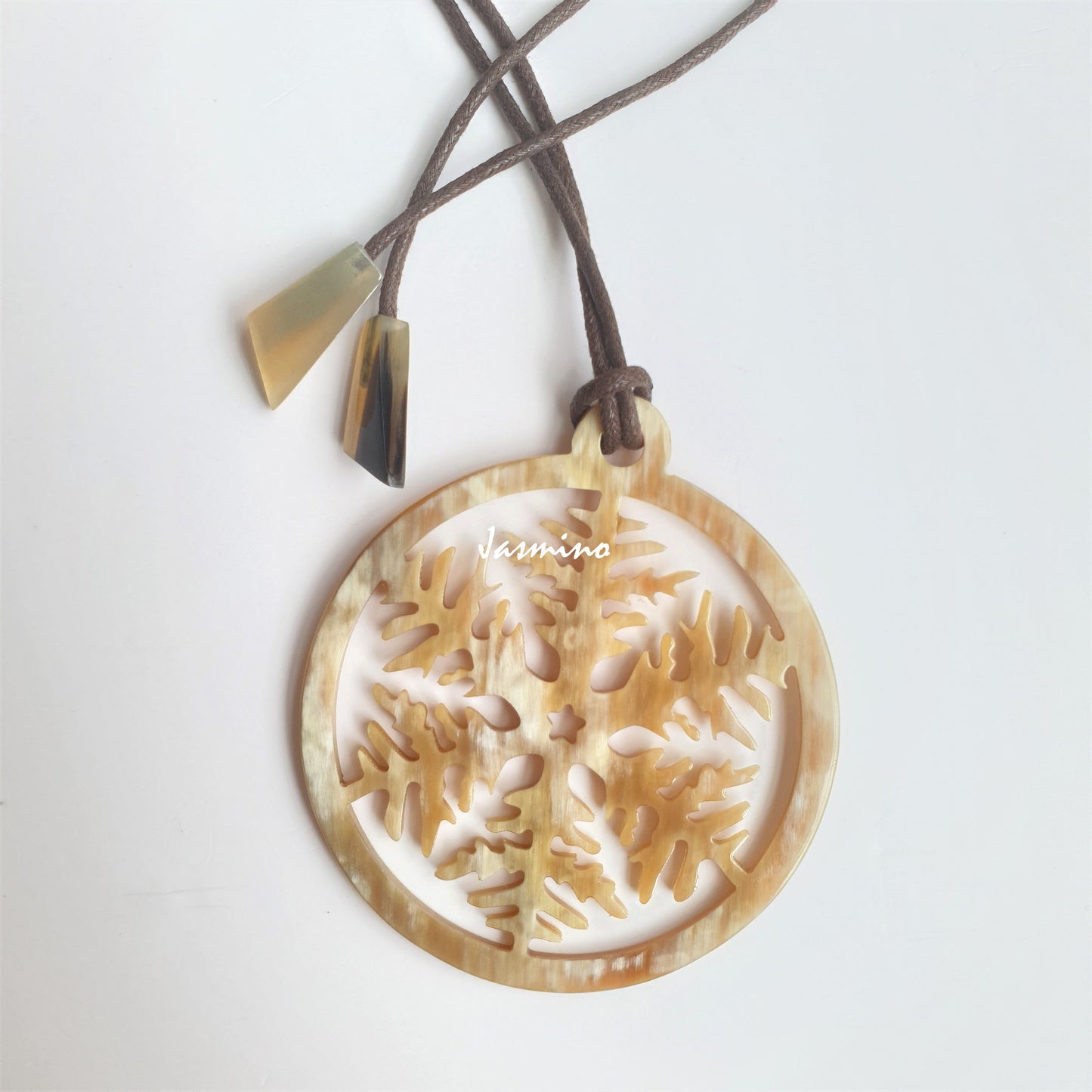 Jasmino unique handmade snowflake circle pendant features a bright colour that is made of natural buffalo horn for Christmas gifts