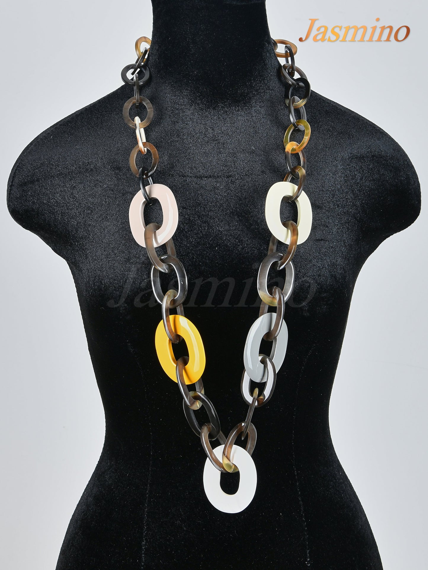 unique handmade Vintage large chain link necklace jewelry is shaped by a donut with yellow and white in natural buffalo horn