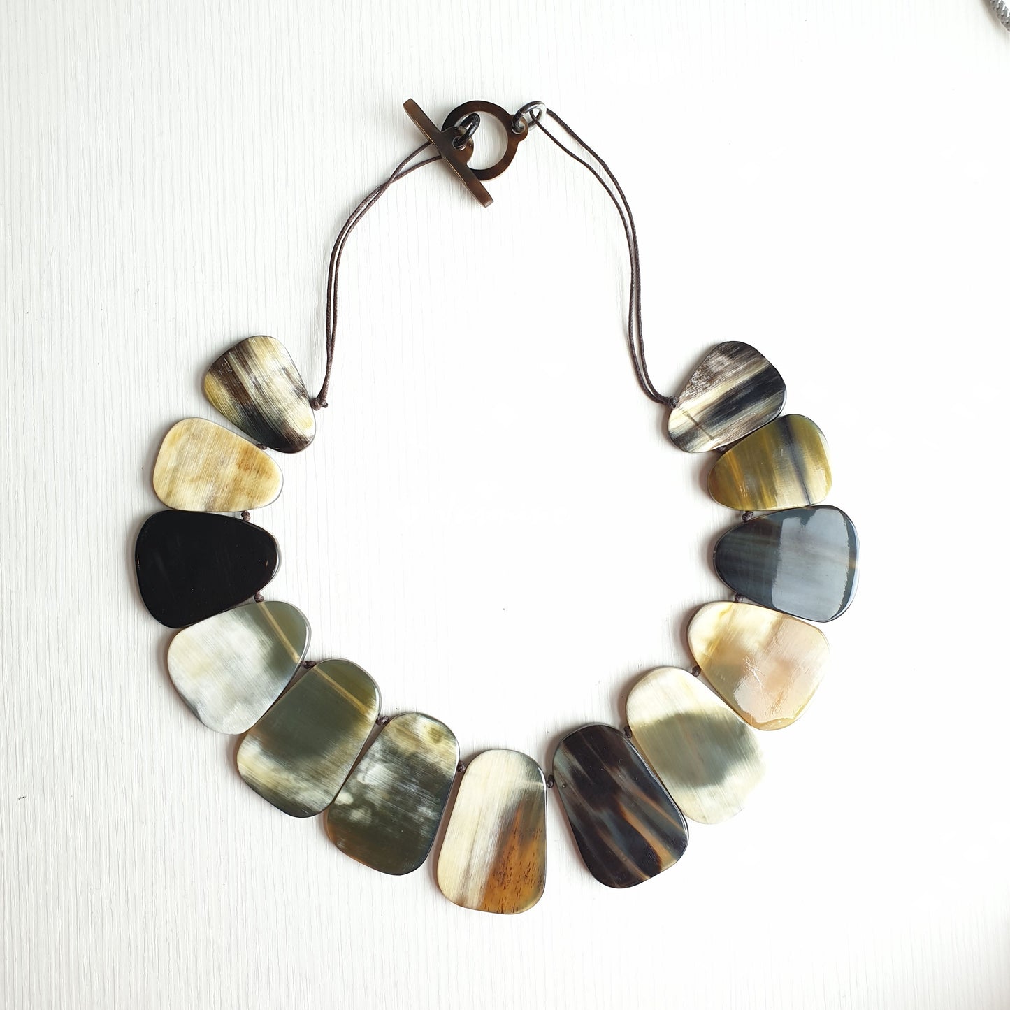 unique handmade Ethnic Bohemian necklace accessory features brown and white in natural buffalo horn on festivals