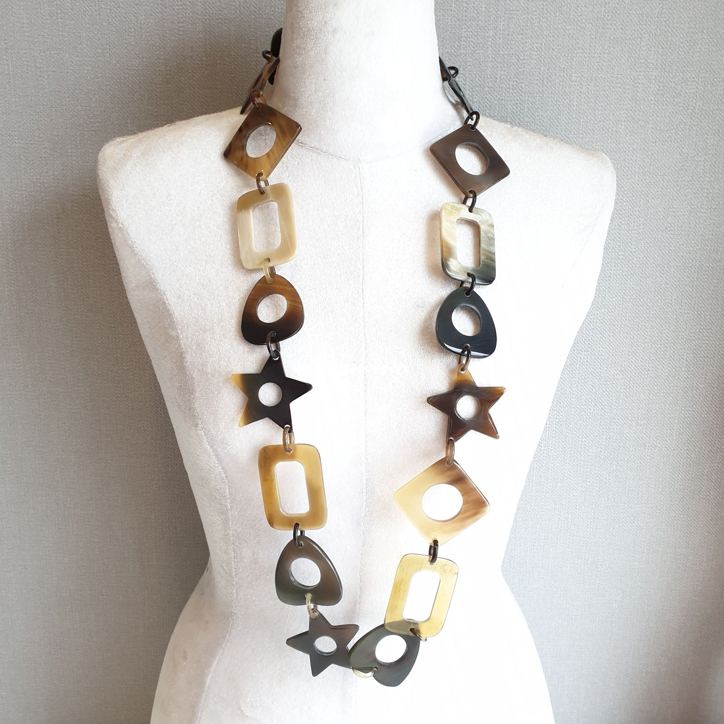 unique handmade large chain link necklace accessory features star and rectangle in natural buffalo horn