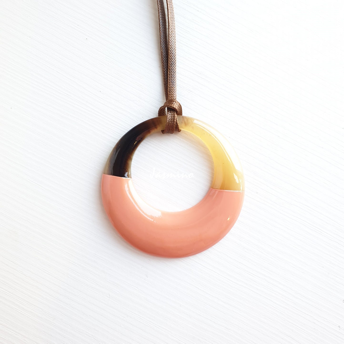 circle pendant is designed with the top half of a natural buffalo horn and the bottom half is painted coral pink, unique gift for her