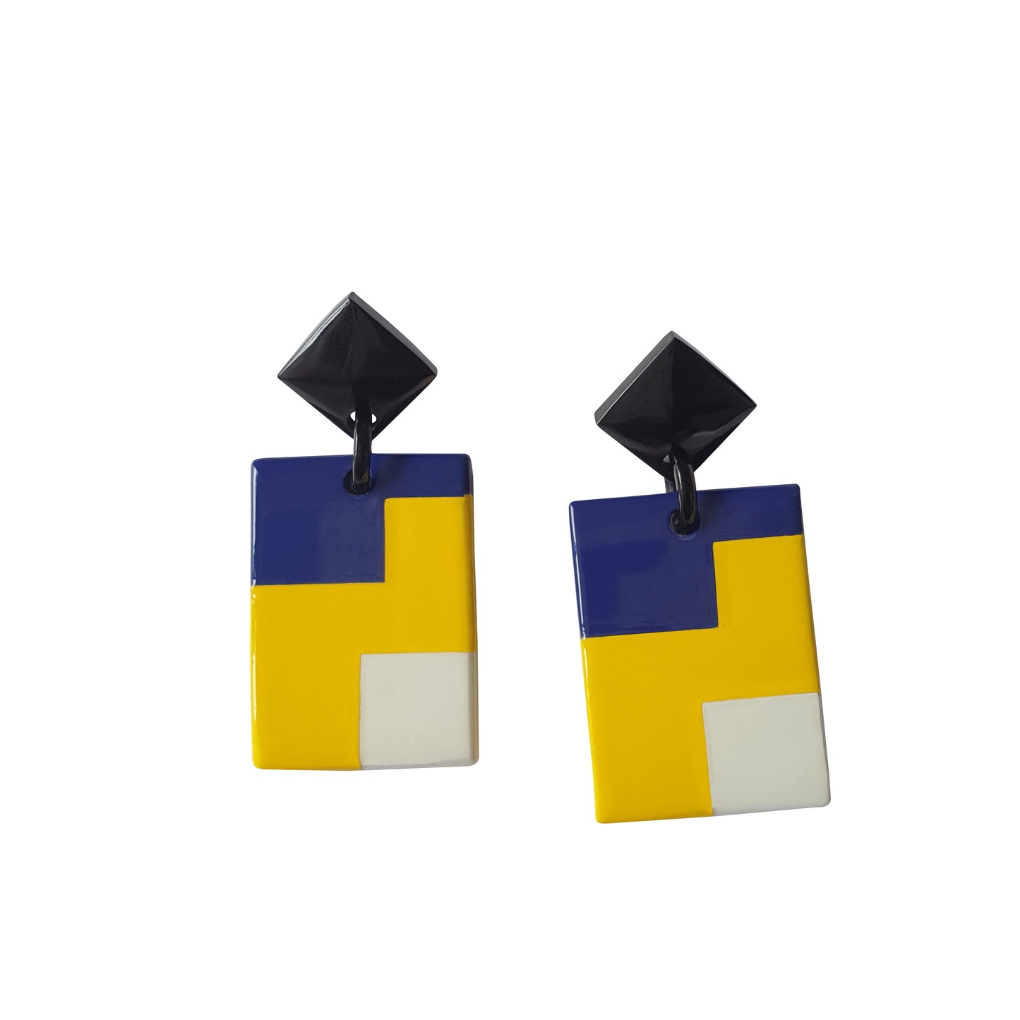 Handmade rectangle drop earrings are designed by navy blue, yellow, and white on a white background