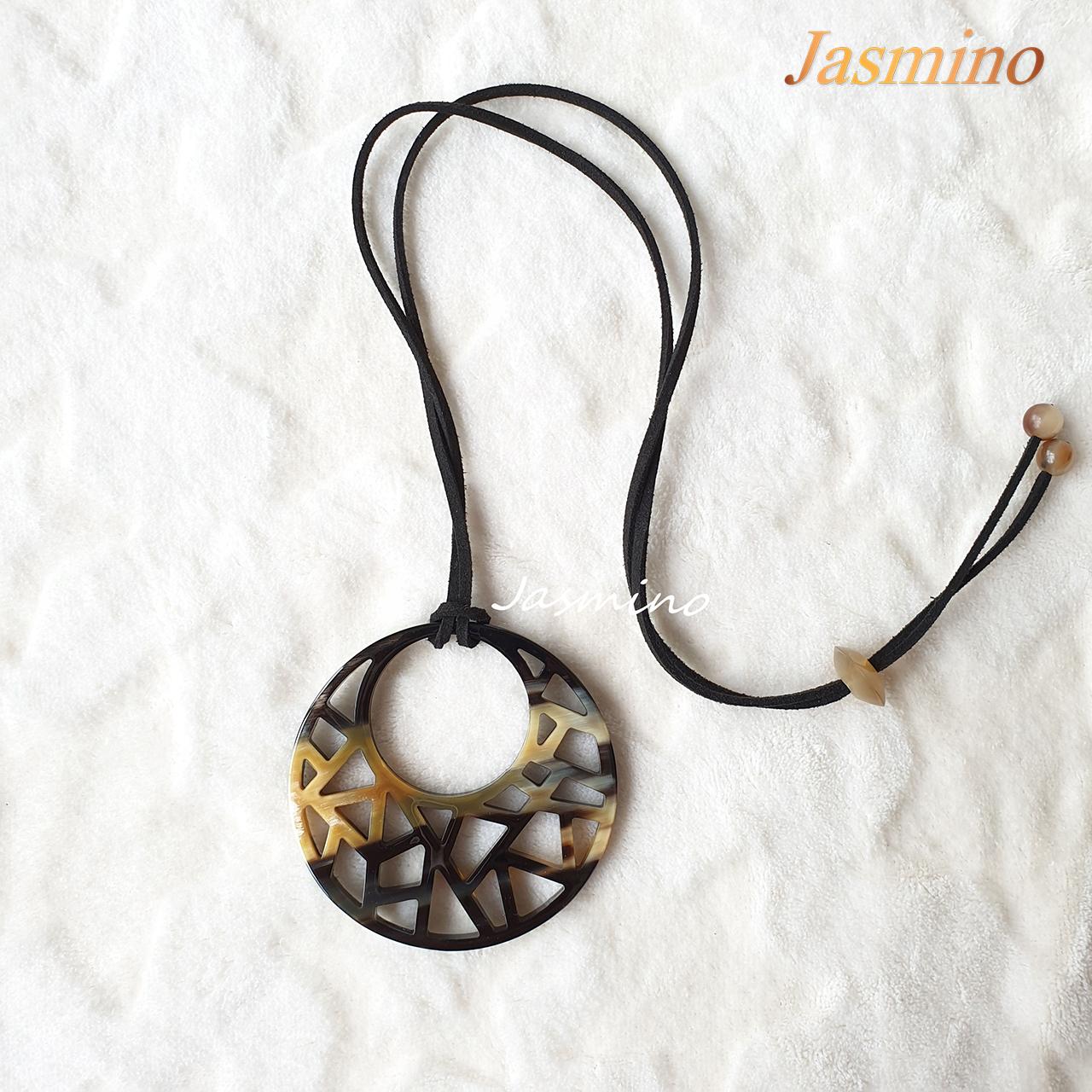 unique round dark buffalo horn lacquer pendant on the light background, jasmino.vn, impressive gift for her